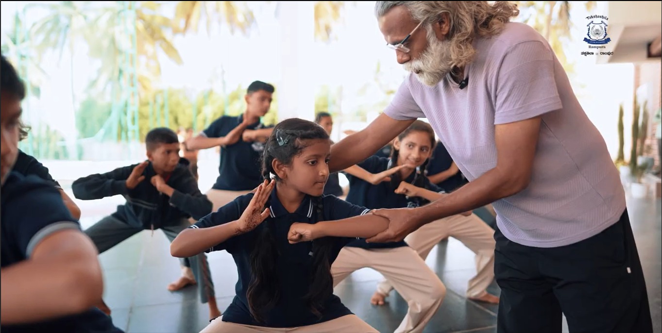 Instructor teaching Kalaripayattu to students at Takshashila School @ Rampura