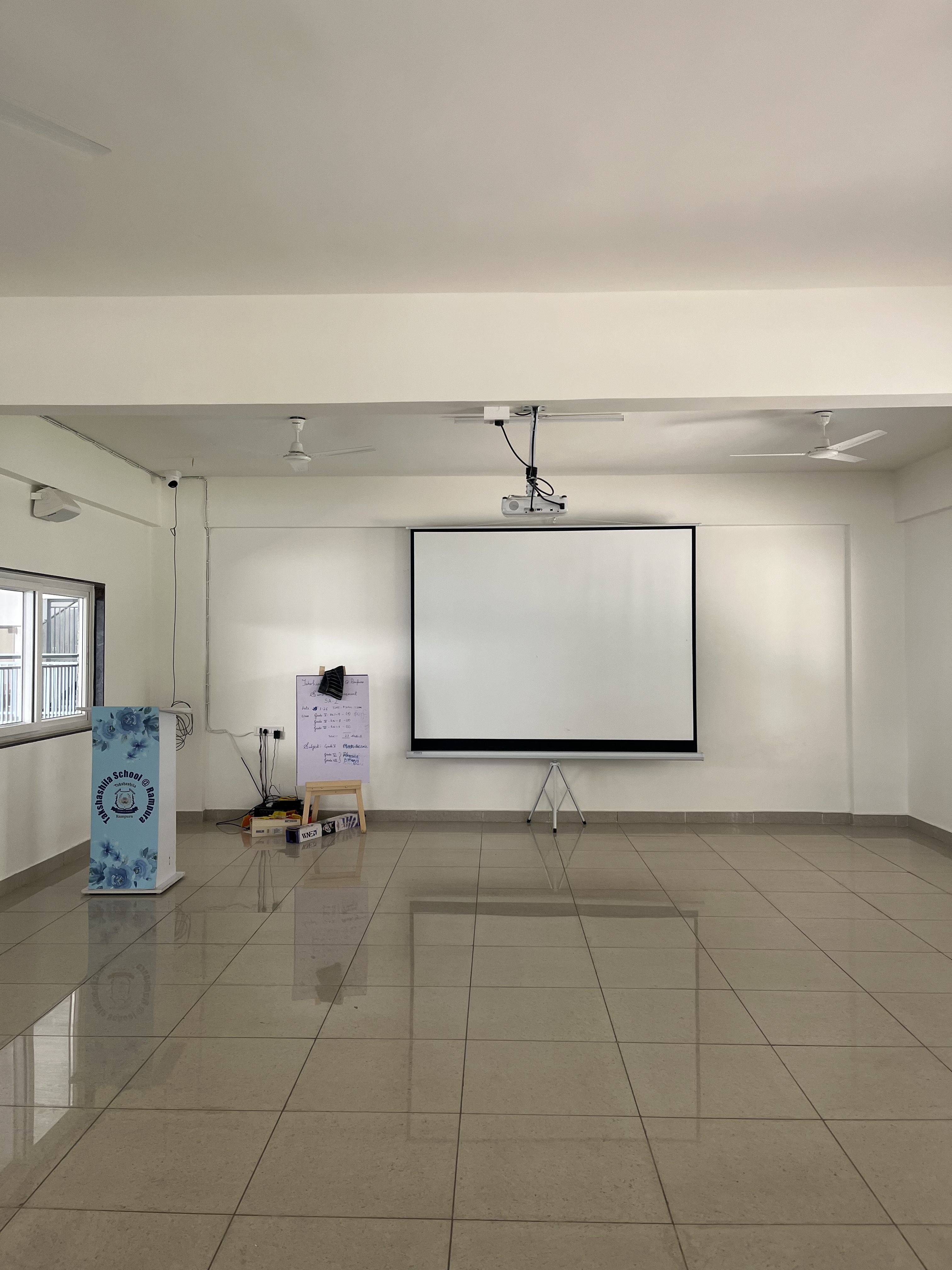 Audio-visual room with projector screen at Takshashila School @ Rampura